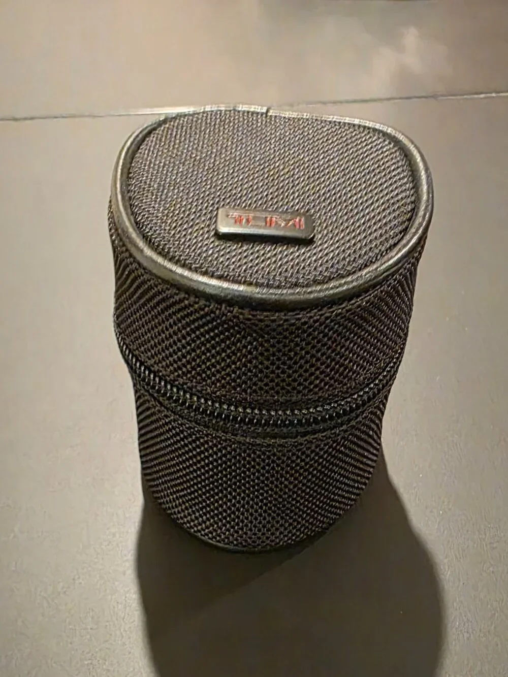 TUMI Travel Charger with case. World Travel Charger for use in over 30 countries